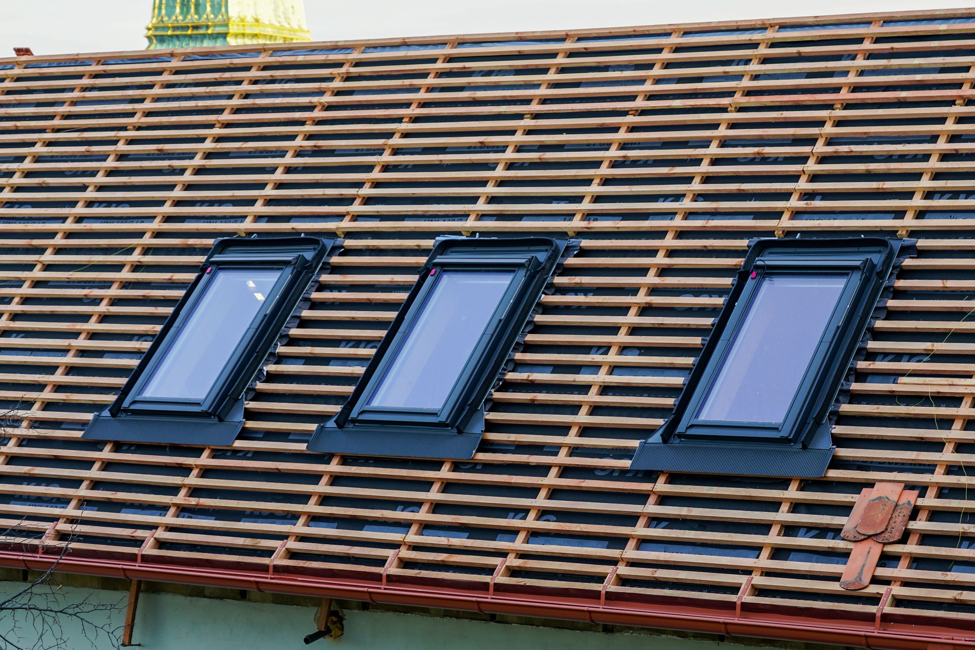 Replacement of house roof structures and installation of new skylights, new roof windows